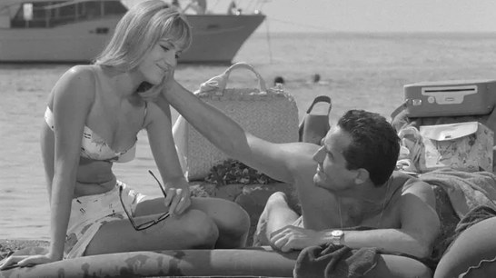 Couple on the beach, vintage black and white photo