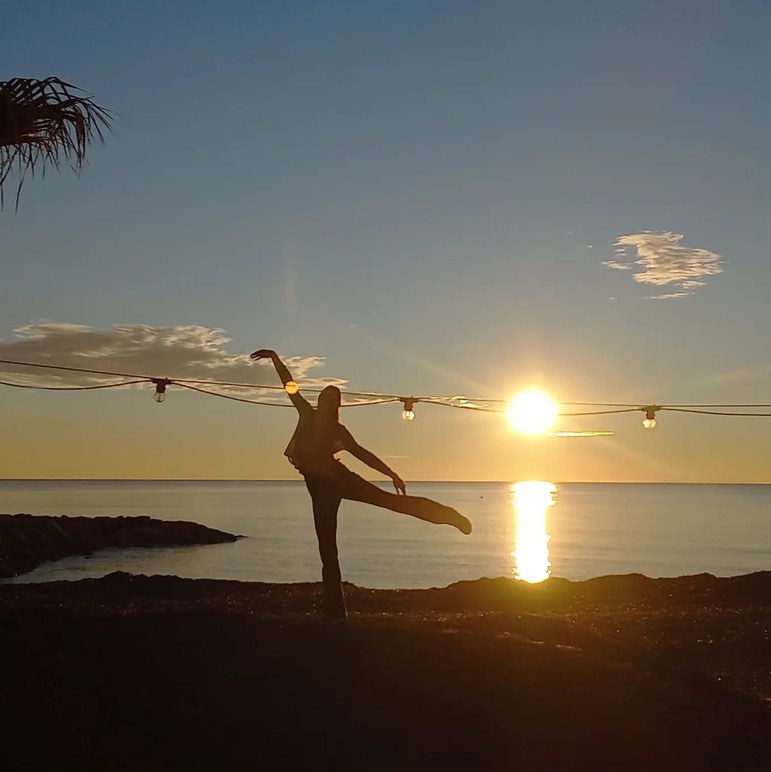 Dance step at sunset by the sea