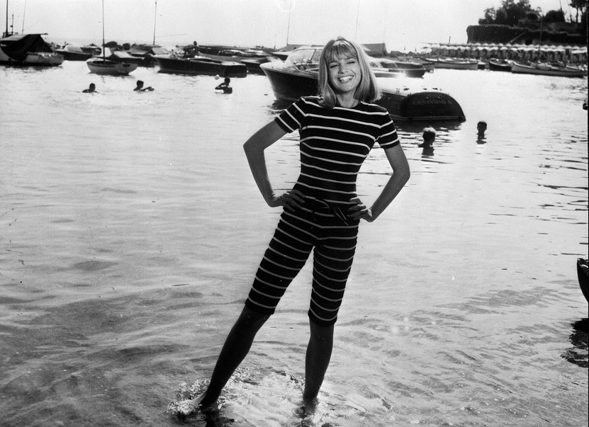 Girl in a striped top by the sea, vintage photo