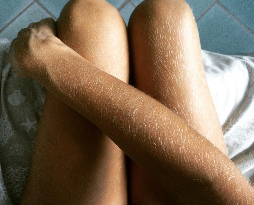 Crossed tanned legs